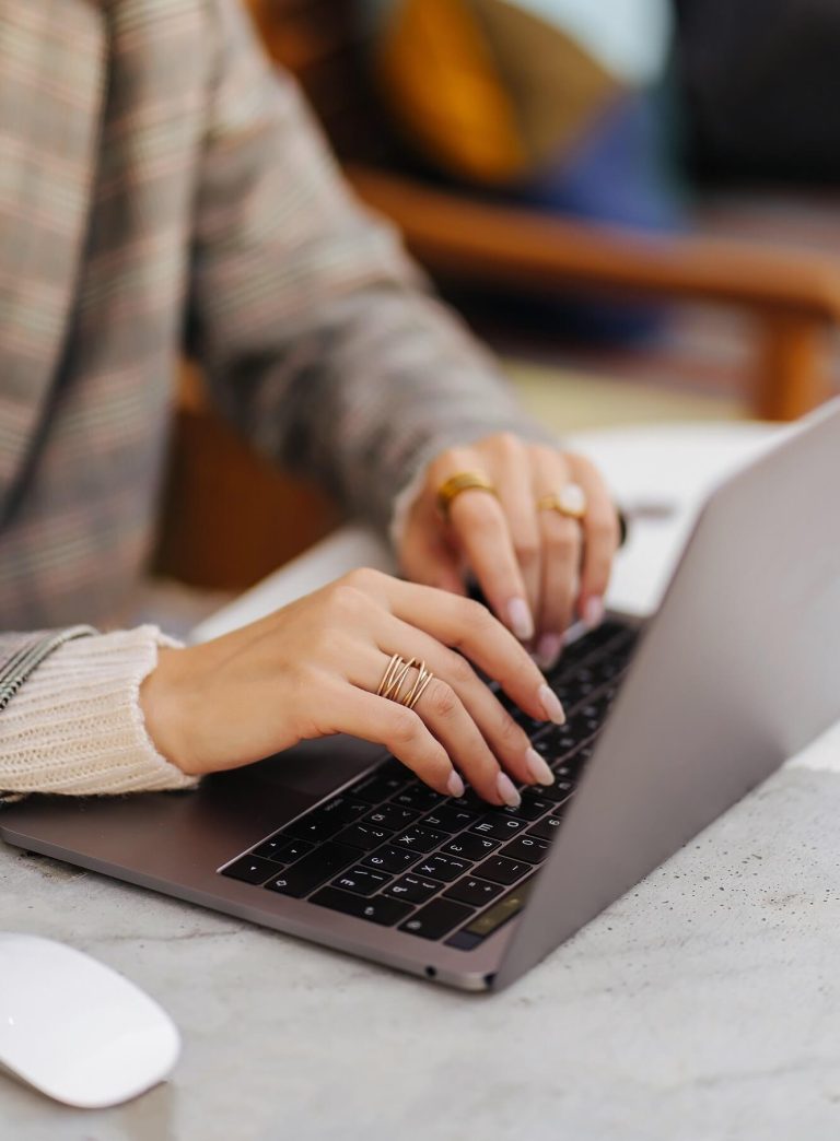 Women is searching for divorce papers online on her laptop